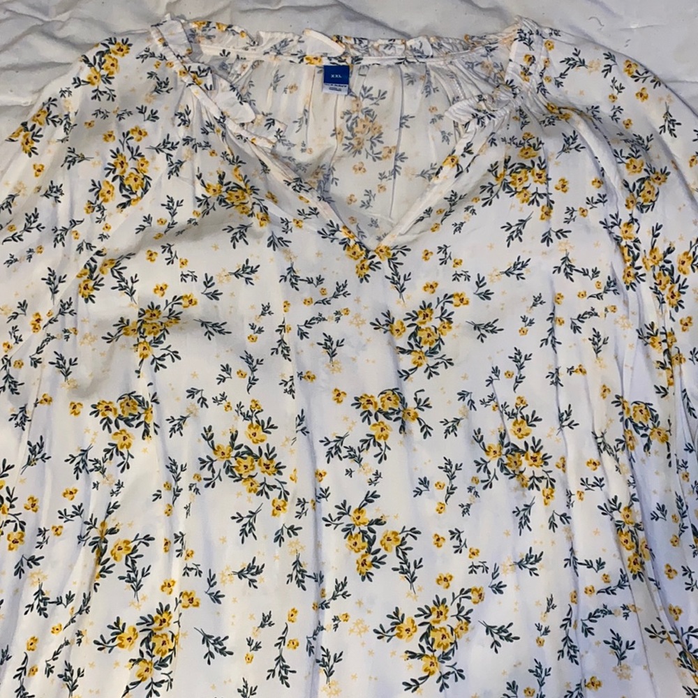 Yellow floral long sleeve ruffled collar v neck blouse.